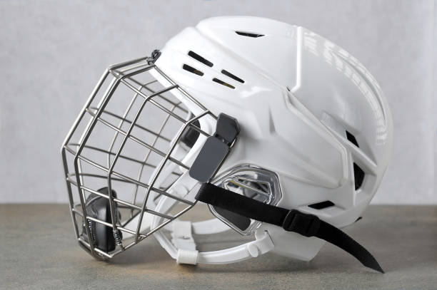 istock white hockey helmet with mask 1171450196
