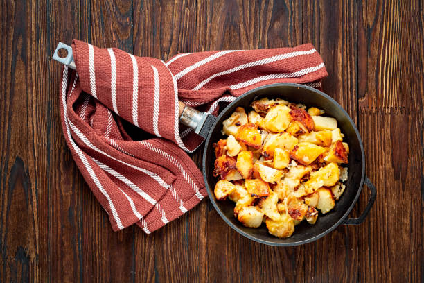 istock Fried potatoes, homemade, oven, bacon, cubed, crispy, sliced, pan, breakfast, easy, Home Dinner 1171450366