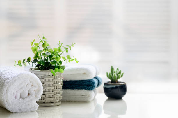 istock White towels on white top table with copy space. 1171451106