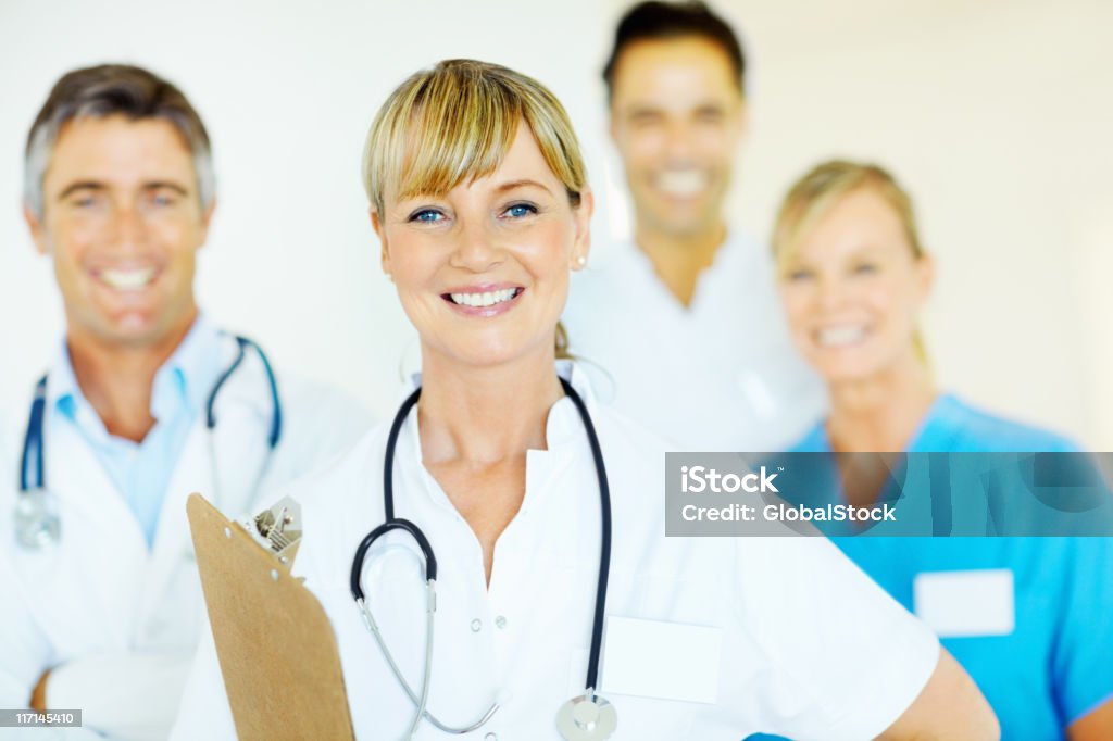 Linda médica com sua equipa - Royalty-free Doutor Foto de stock