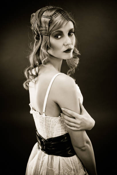 istock Pretty Blond Woman on dark background 117145435