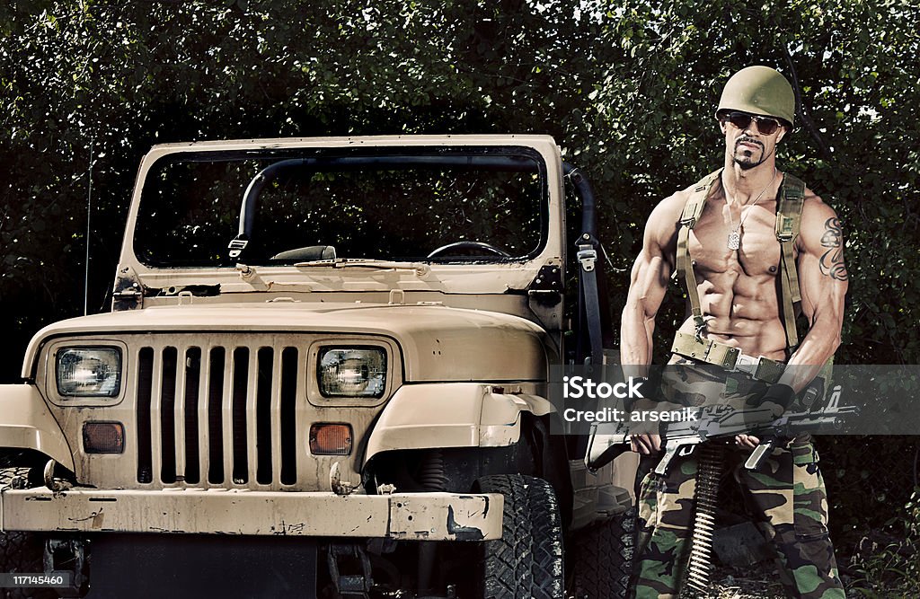 Soldier Holding Machine Gun Beside Jeep Stock Photo - Download Image Now -  4x4, Army, Off-Road Vehicle - iStock