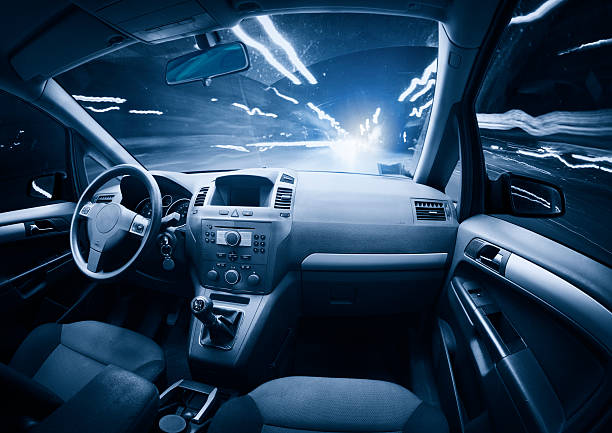 Fast ghost car into the light traffic. Driving through the City at Night. Interior view. Traffic car create the light. inside of flash stock pictures, royalty-free photos & images