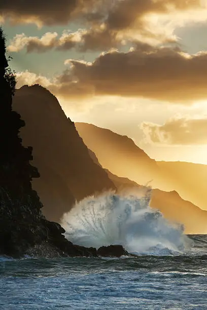 Photo of Surf smashing into Na Pali coast in Hawaii.