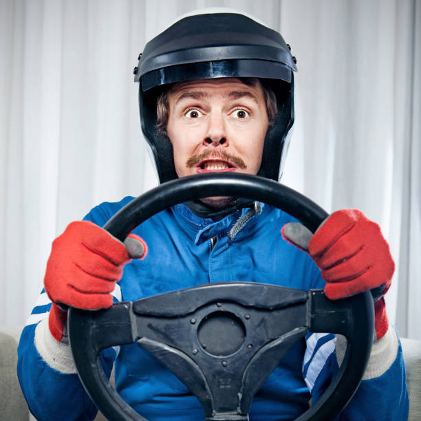 mann driving - driving speed humor video game stock-fotos und bilder