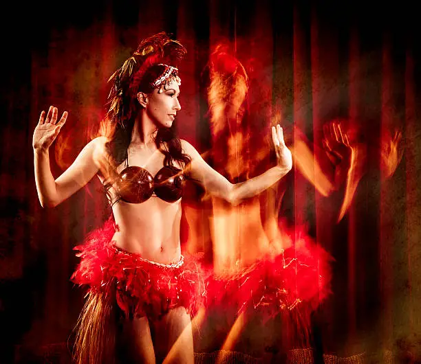 Beautiful Ghosted Hula Dancer. Taken with long exposure, stylized with grunge effect.