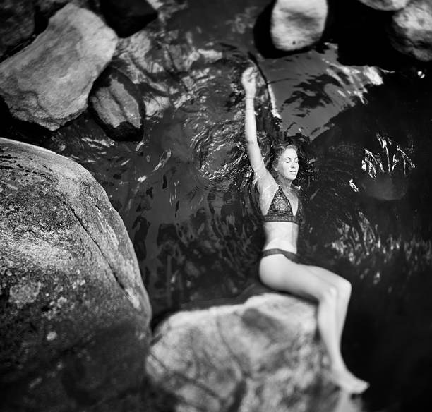 istock Beautiful woman relaxing in water 117146048