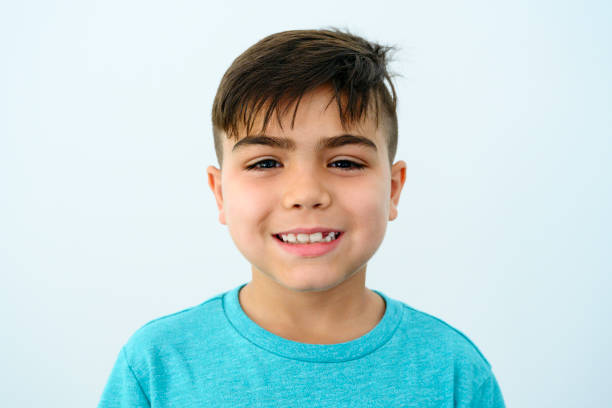 istock Portrait of smiling Hispanic boy 1171460979