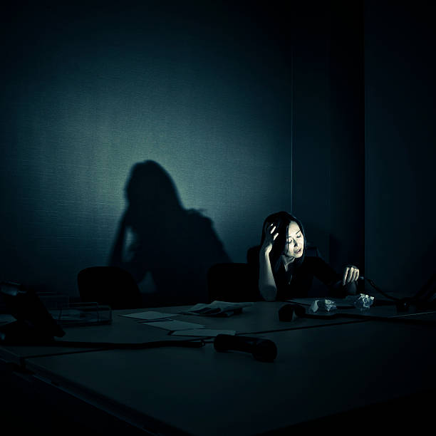 stressed businesswoman alone in her office