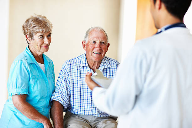 istock Doctor and an elderly couple 117146480