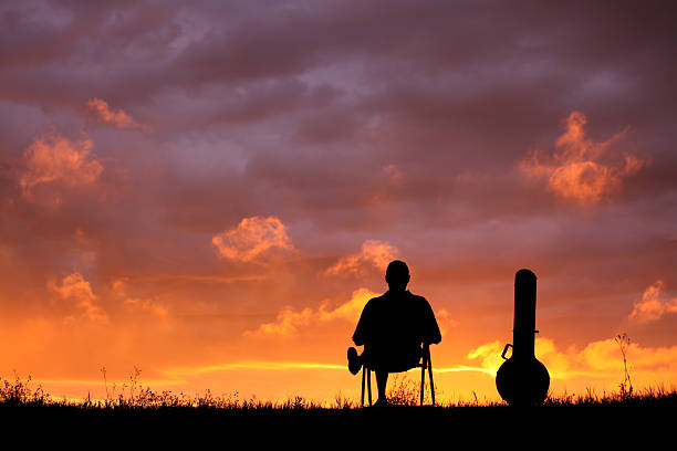 istock Silhouette of a Man and His Banjo 117146905