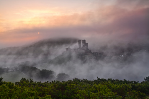 A stunning misty morning at Corfe Castle in Purbeck Dorset