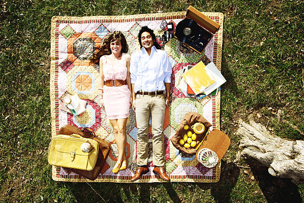 young adult engaged heterosexual couple mixed race happiness - Strobe front light - Lens Flare and Sun Back Light intentional
