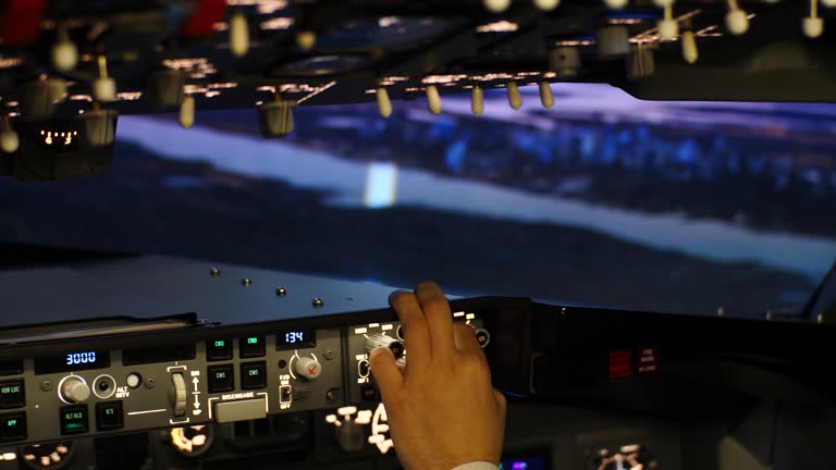 Cockpit of a passenger plane in flight at dusk