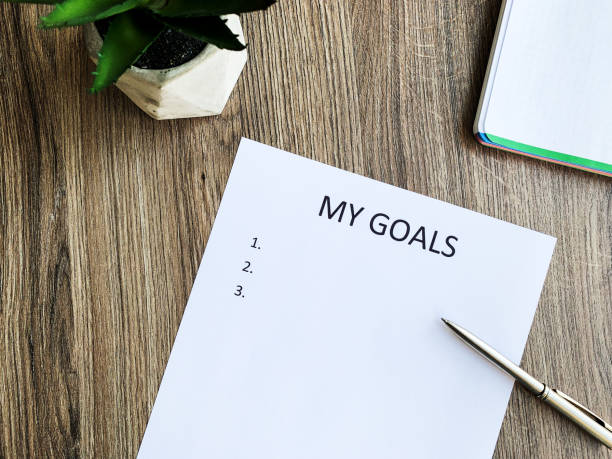 istock Clipboard with my goals on wood desk. 1171473531