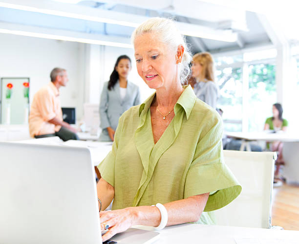 istock Modern Businesswoman working on a Laptop 117147364
