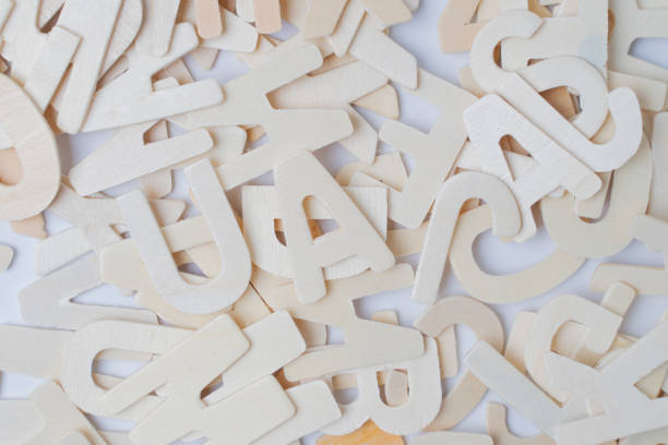 istock ABC english wood letters on white blackground 1171473898