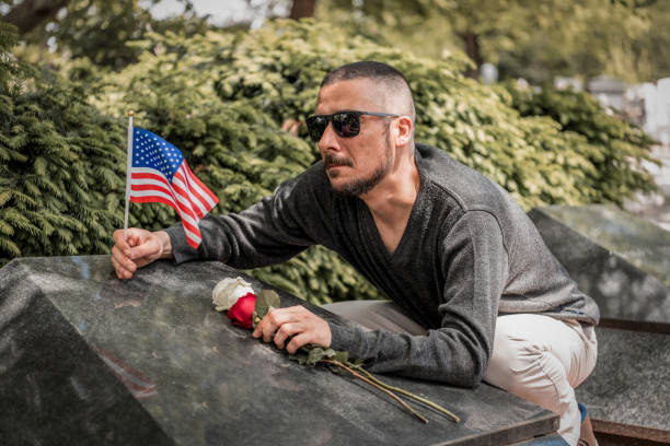 istock Sad widower, adult man visits cemetery. 1171473903