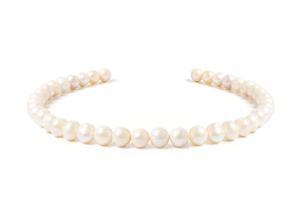 istock pearl necklace isolated on white blackground 1171474437