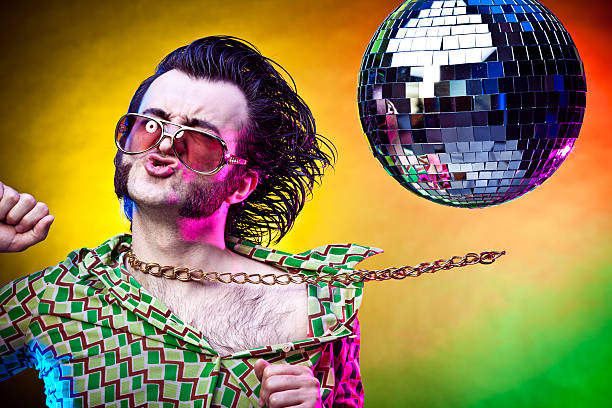 istock disco dancing vintage man making a face at party 117147704