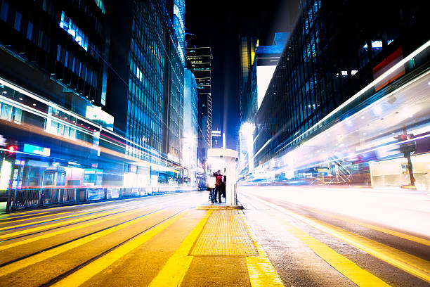 Futuristic crossroad at night Night city road in motion. Motion blur. car street blue night stock pictures, royalty-free photos & images