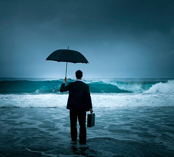 istock Business Risk Businessman Facing the Storm 117147798