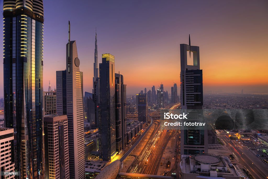 Skyline of Dubai Financial District Sheikh zayed road with view on Burj Khalifa in the background Dubai Stock Photo