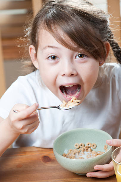 istock Girl Eating Cereal 117148032