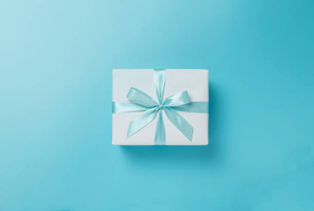 istock Top view of white gift box with Blue ribbon 1171480346