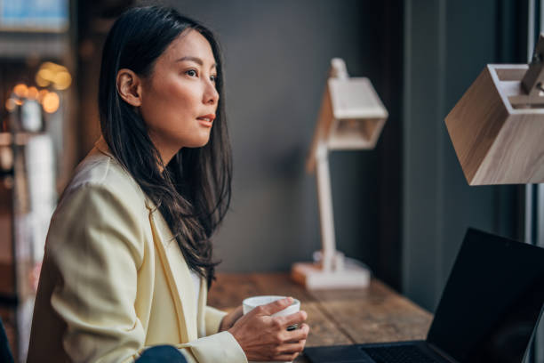 istock Businesswoman drinking coffee 1171481023