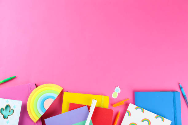 istock Various school supplies and accessories on textured background. 1171481190