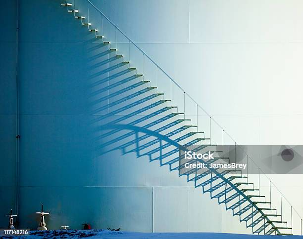 White Staircase And Shadow On Oil Storage Tank Stock Photo - Download Image Now - Abstract, Staircase, Factory