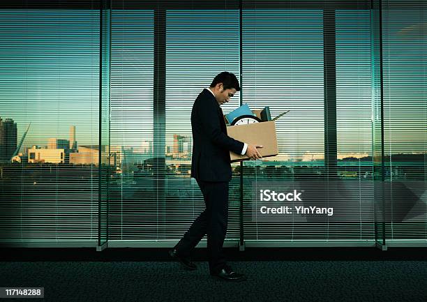 Asian Office Worker Leaving His Job In Layoff For Recession Stock Photo - Download Image Now