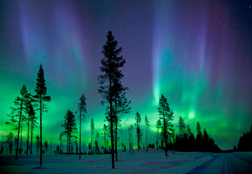 Aurora borealis photographed in the early hours of the morning in arctic circle.