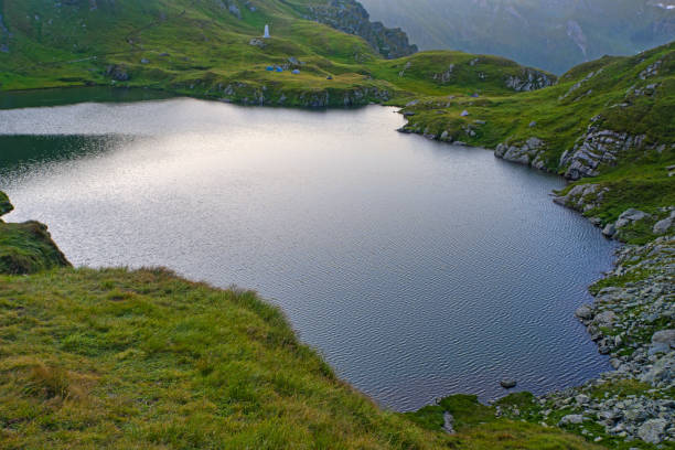 istock Glacier lake in Romanian Carpathians, summer landscape 1171483869