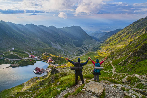 istock Happy tourists in Romanian mountains 1171483903