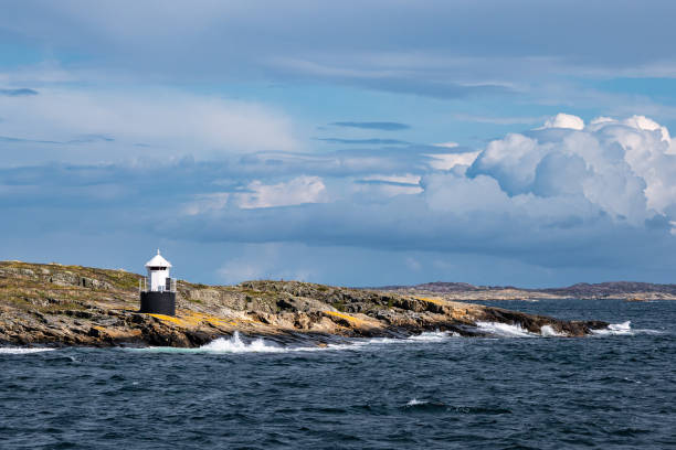istock View to a lighthouse on the island Orust in Sweden 1171484326