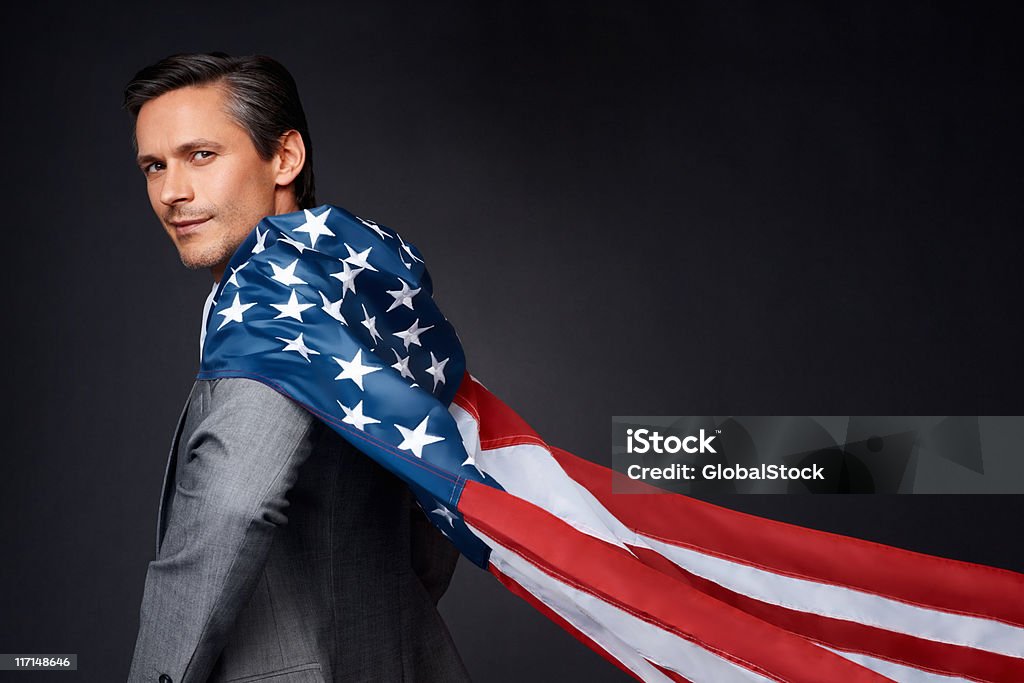 Homme d'affaires portant Drapeau américain - Photo de Cape libre de droits