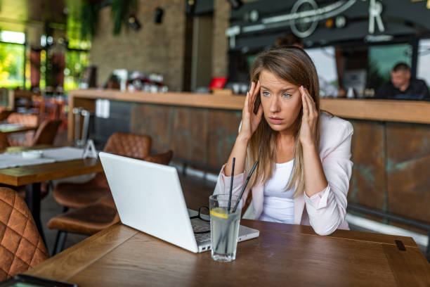istock Overworking business woman suffering from headache 1171486726