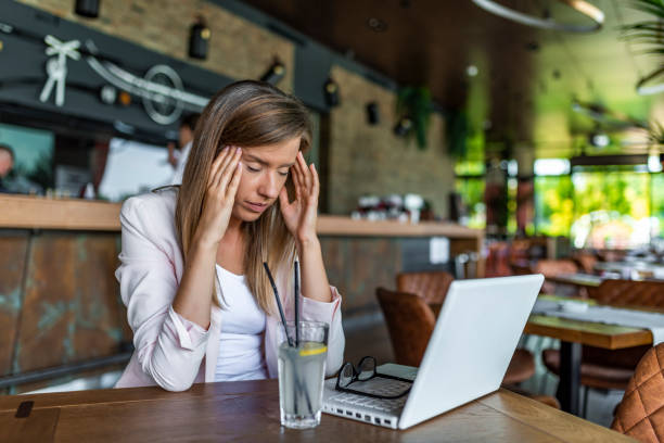 istock Young beautiful businesswoman tired from work. 1171486945