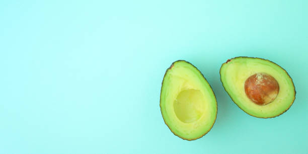 istock avocado (green and ripe fruit, vitamins) top menu concept. food background. copy space 1171488191
