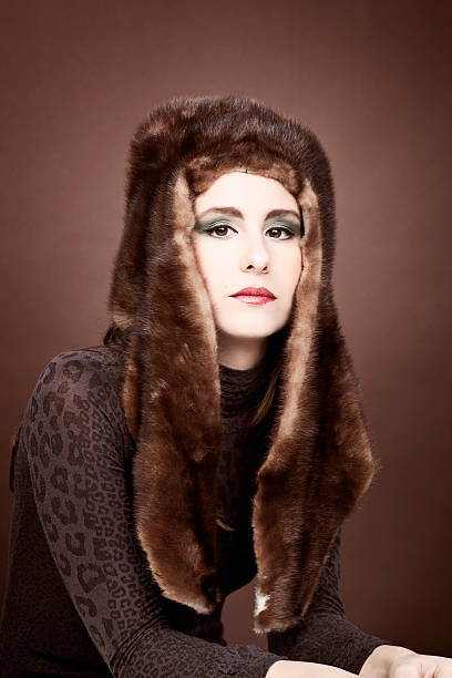istock Eccentric woman with odd fur hat. 117149161