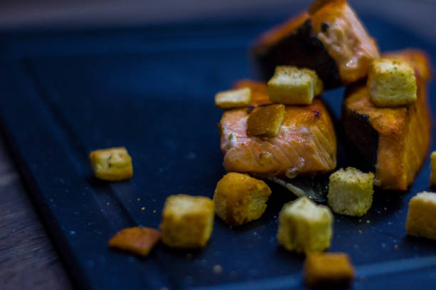 Grilled salmon with croutons.