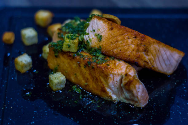 istock Grilled salmon with croutons. 1171495137