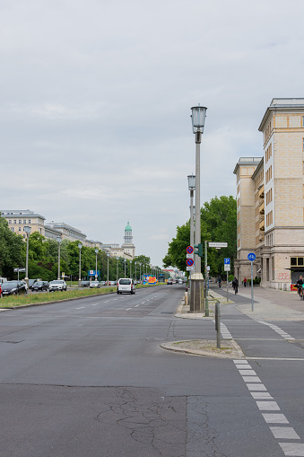 Berlin, Germany-May 26, 2019: Walking through the street Karl-Marx-Allee of Berlin in the Friedrichshain district