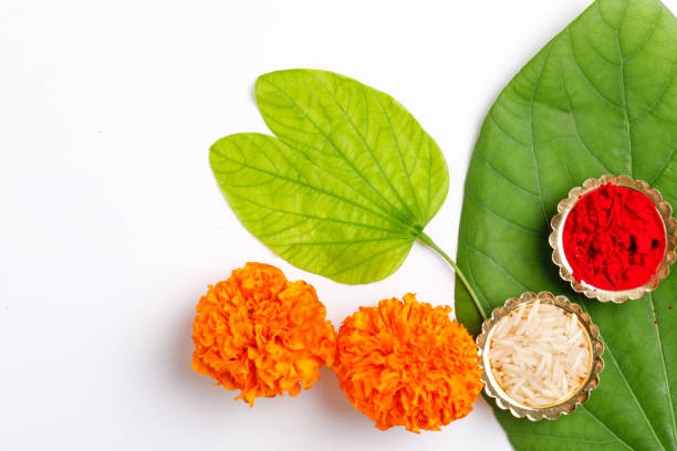 istock Happy Dussehra greeting card , green leaf and rice 1171496321