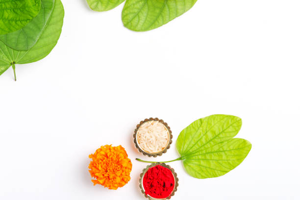 istock Happy Dussehra greeting card , green leaf and rice 1171496364