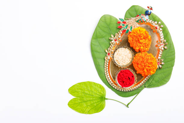 istock Happy Dussehra greeting card , green leaf and rice 1171496417