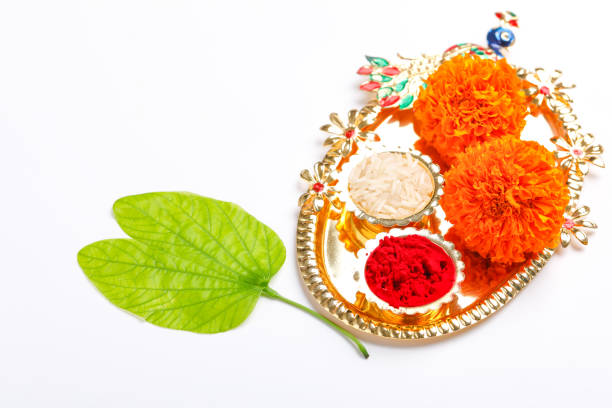 istock Happy Dussehra greeting card , green leaf and rice 1171496495