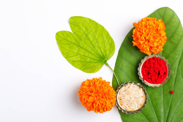 istock Happy Dussehra greeting card , green leaf and rice 1171496516
